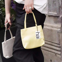 HAI英国小众设计品牌真丝绸缎单肩斜挎包休闲时尚纯色小包ins风