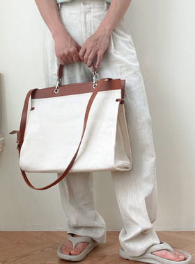 时尚韩国Theaction托特包潮流男手提包黑白撞色帆布包斜跨单肩包