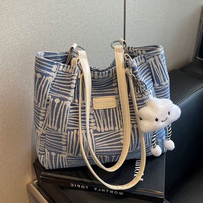 休闲大容量包包女士2025新款时尚单肩包小众百搭通勤包上班托特包