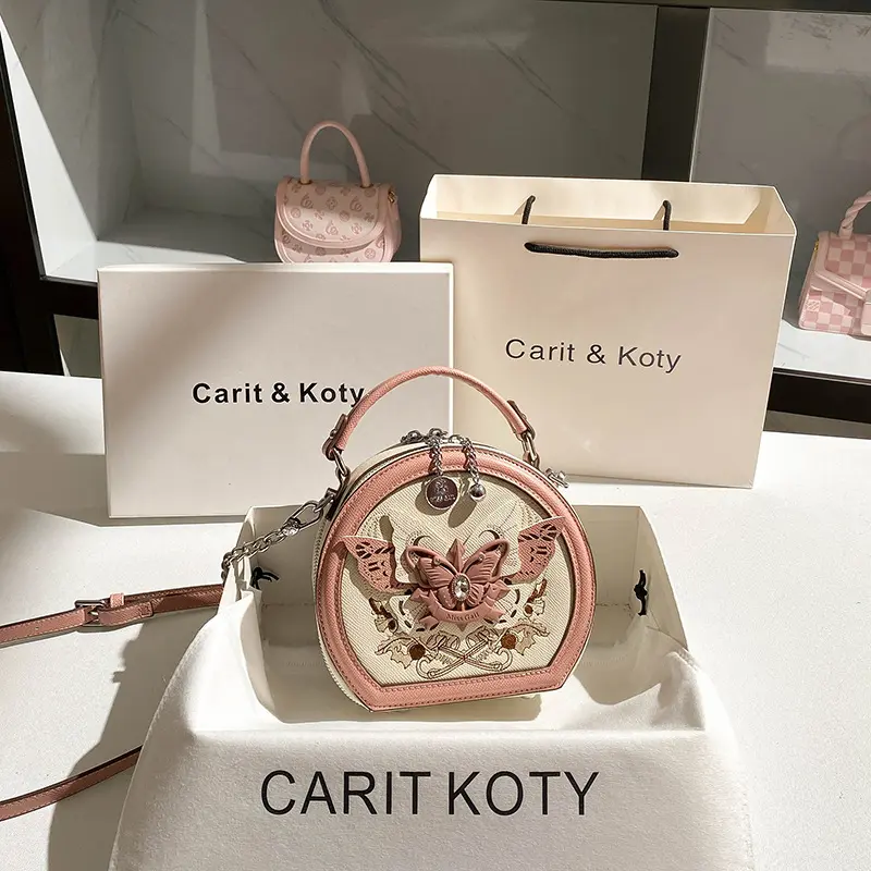 一件中国风重工刺绣圆饼包包2025新款高级感撞色小圆包