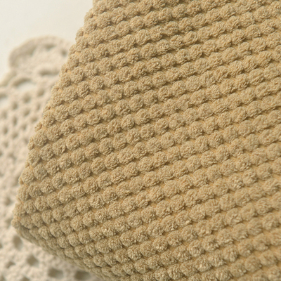 做旧姜黄立体豆豆绒聚酯纤维布料