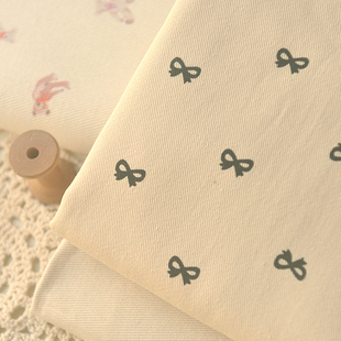 米底黑蝴蝶结斜纹纱卡麻棉 春连衣裙外套服装短裤包包裤子面料