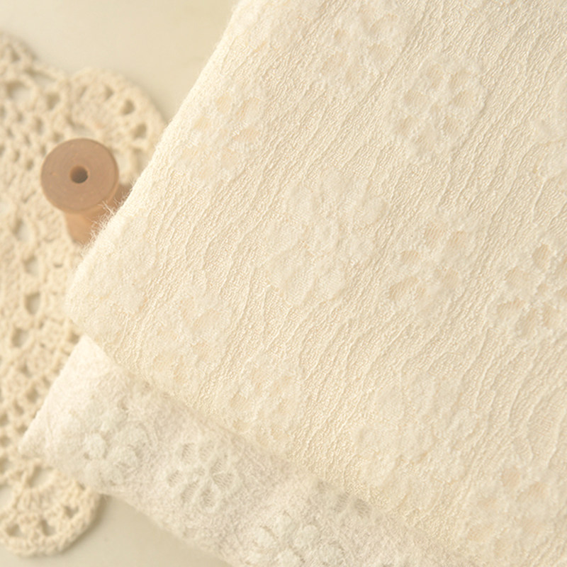 杏色淡米黄镂空花瓣聚酯纤维布料长裙汉服旗袍连衣裙娃衣窗帘面料