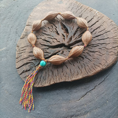 九九归一大道至简返璞归真西藏回收老橄榄核原籽编织手持手串