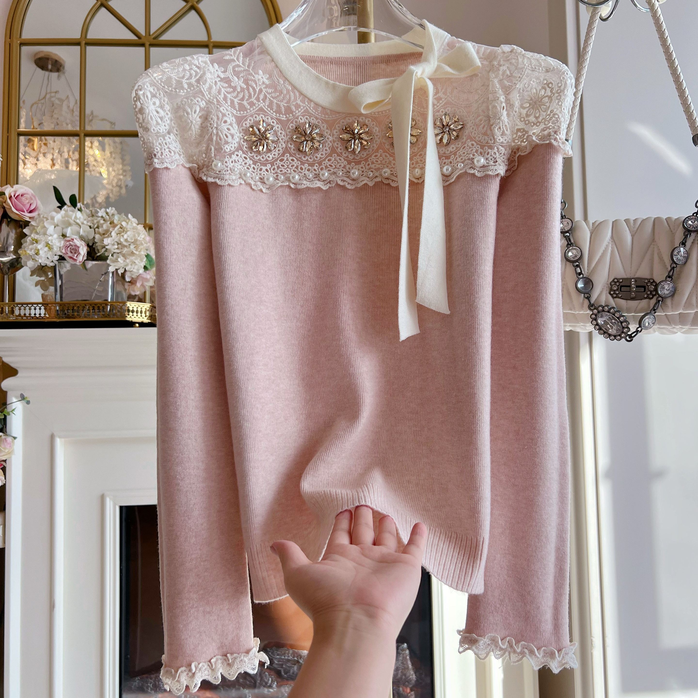 韩国设计感重工镶钻蝴蝶结镂空针织衫宽松套头长袖甜美气质毛衣女