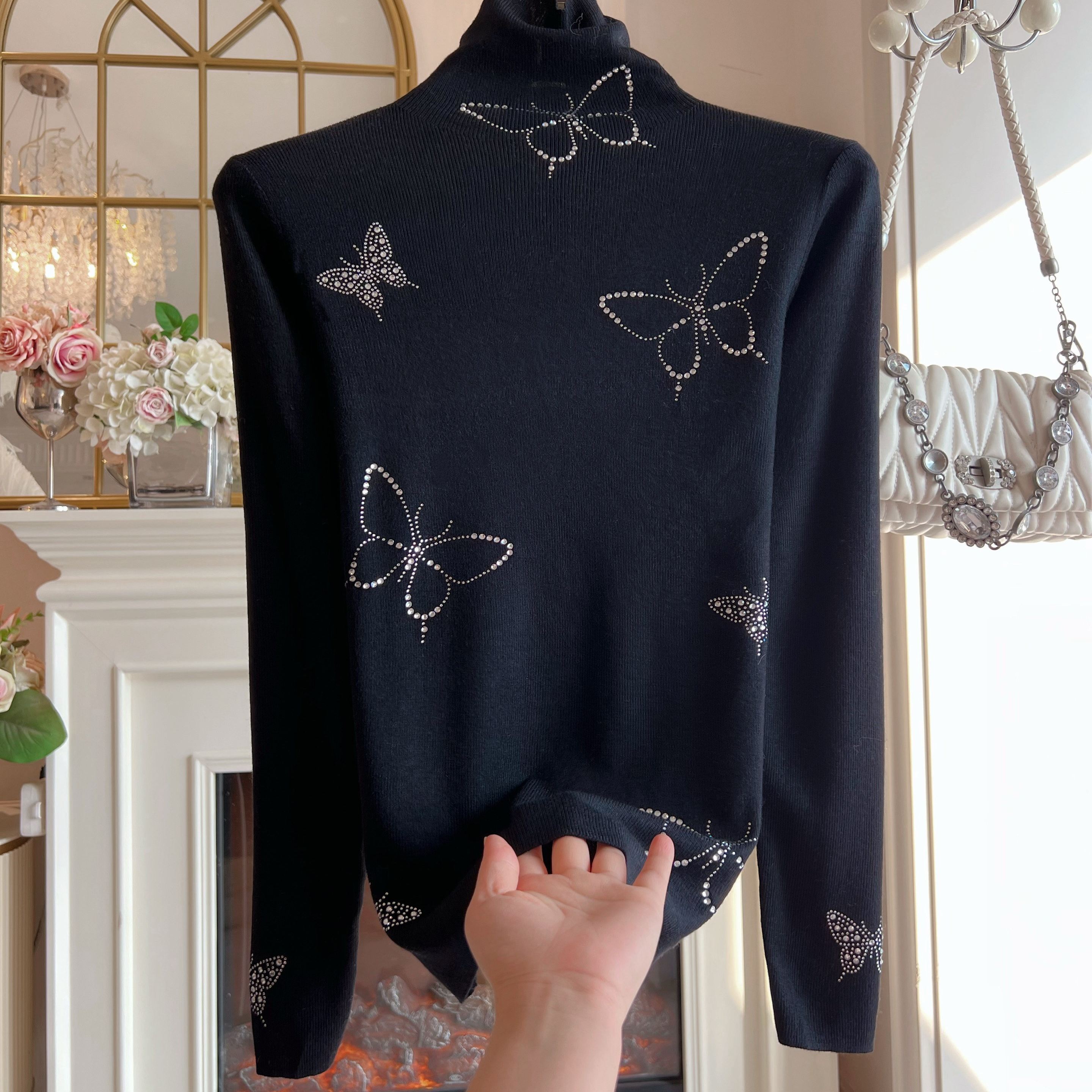 2025年冬季新款高温烫钻蝴蝶结高领打底衫女装重工镶钻黑色针织衫