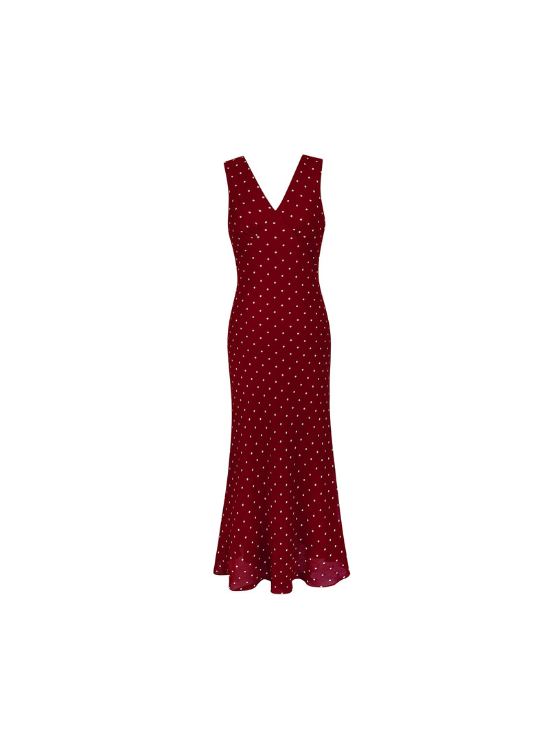 Red polka dot sleeveless long dress on a white background