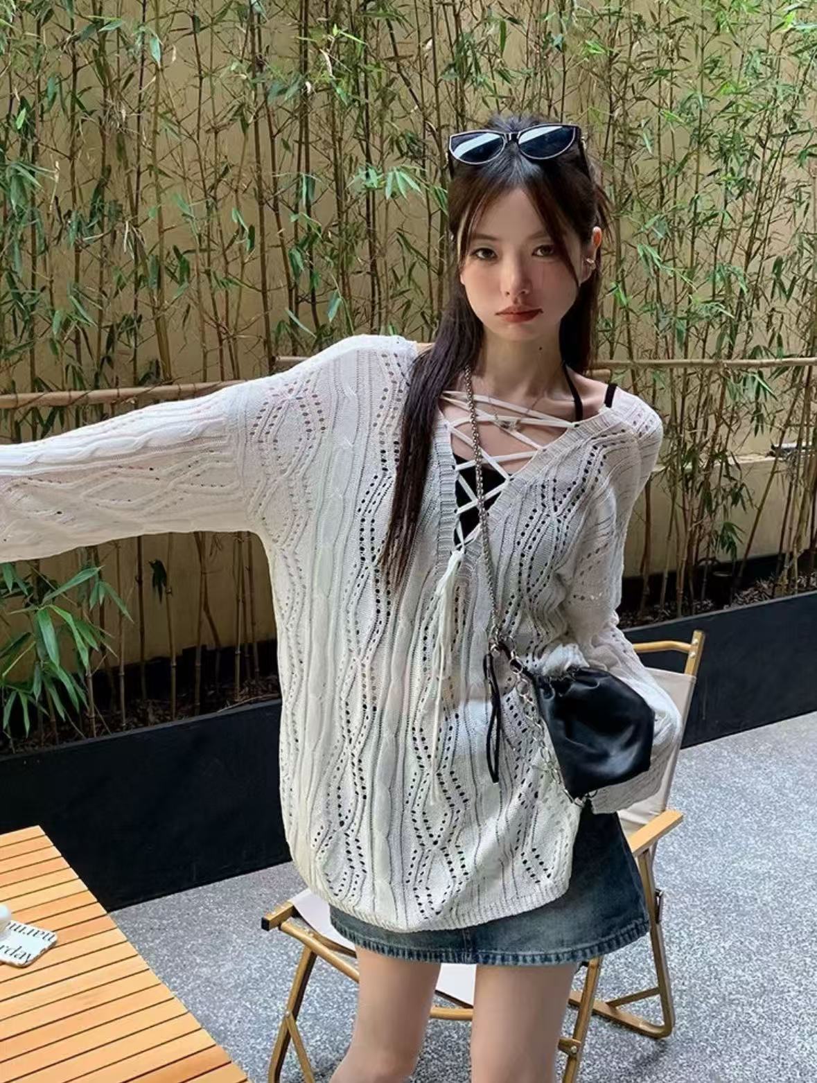 十三行2025秋季新款韩版洋气时尚圆领后背系带镂空时尚针织衫女