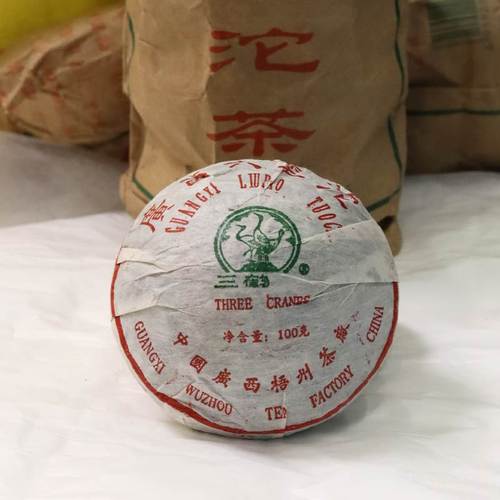 三鹤梧州茶厂06年100克沱木质香