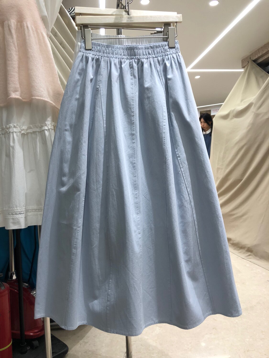 法式气质蓝色高腰口袋a字半身裙女夏2026新款梨形身材中长款伞裙