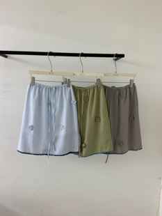 东大门2026夏季韩版设计感细格子立体花朵半身裙宽松显瘦短裙小众