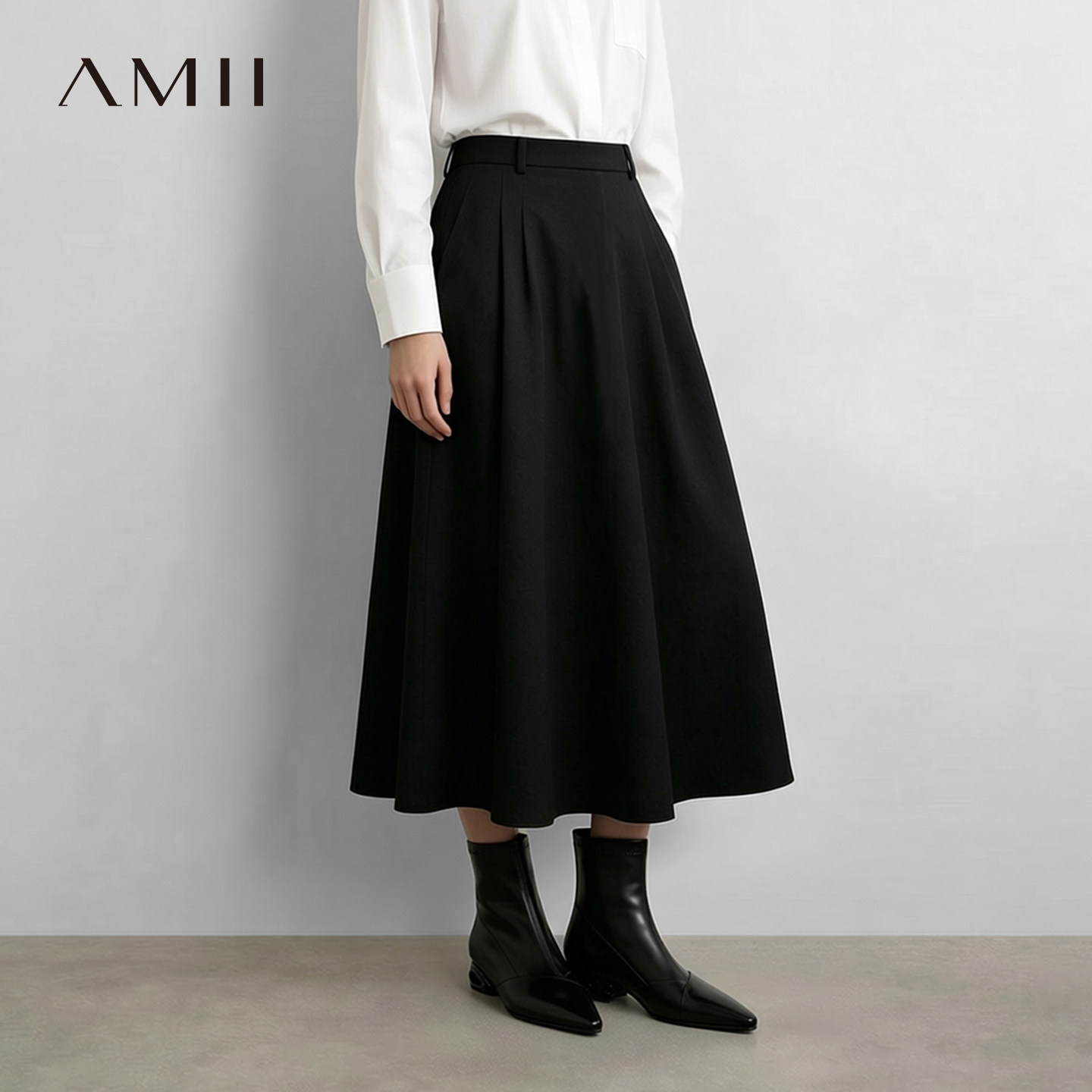 Amii2026秋新款优雅通勤风后橡筋腰棉质半身裙女宽松A字裙中长裙