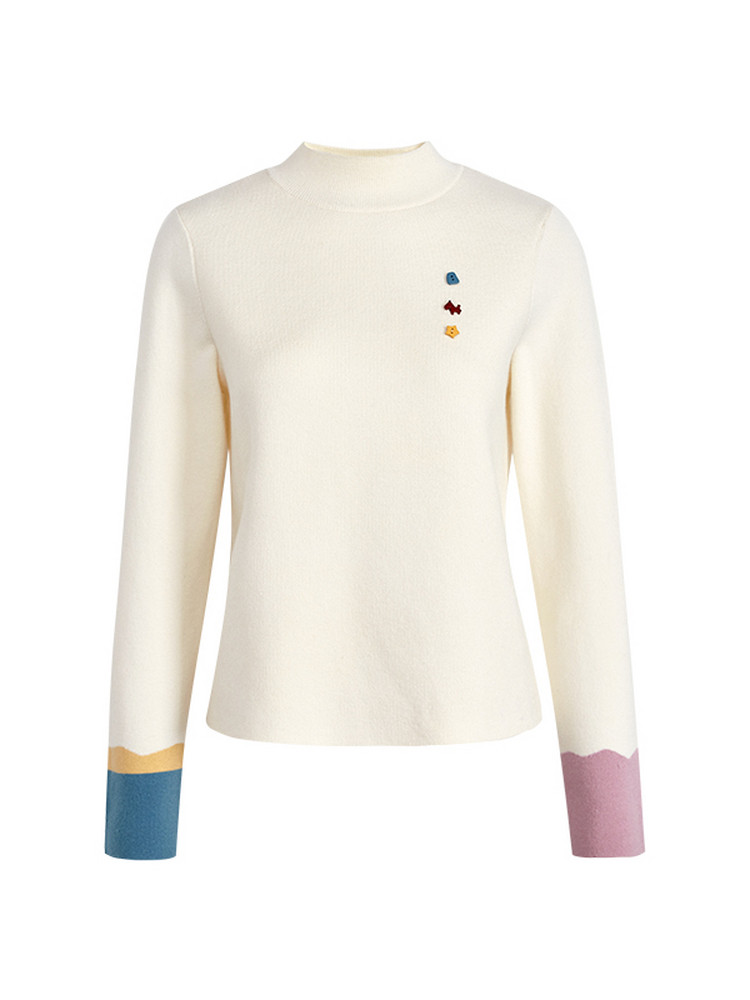 Cream long-sleeve turtleneck sweater with small colorful accents