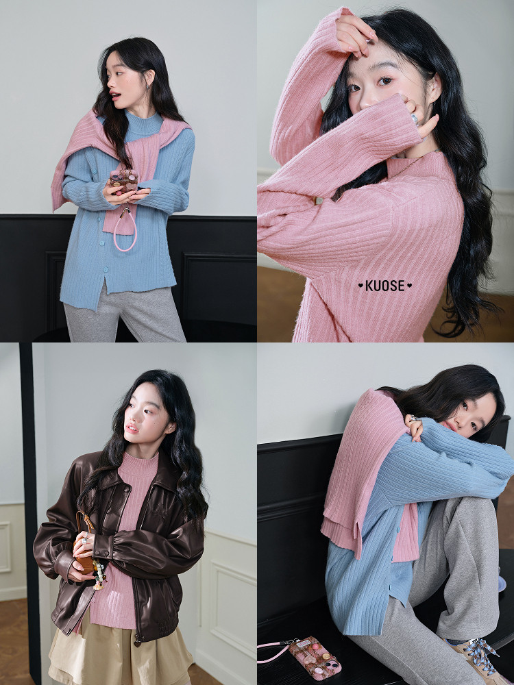 Pink and blue ribbed knit sweater worn by a model