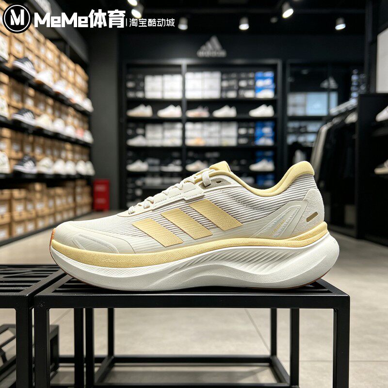 阿迪达斯女鞋2026秋新品浅奶黄三条纹网面轻便回弹跑步鞋 KZ7117