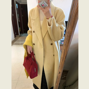 慵懒风黄色双排扣翻领毛呢大衣女秋冬季通勤气质中长款呢子大衣