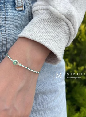 日系小众杂志风轻盈磨砂白拼清新蓝限量工艺透明蓝扣子极细手链