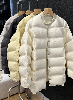 圆领羽绒服女中长款2025冬新款针织拼接泡芙韩版宽松黄色方块外套