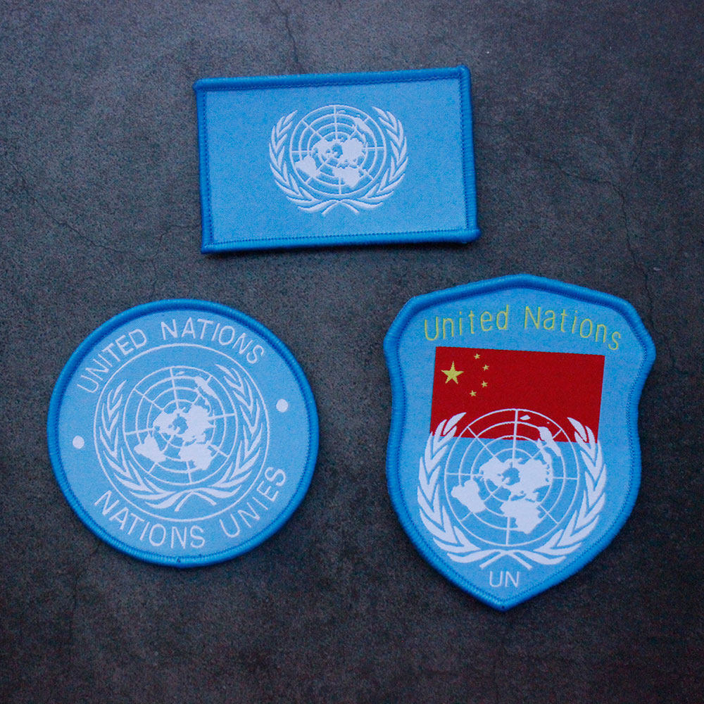 联合国蓝色国旗魔术贴章盾型臂章徽章织唛布贴背包贴装饰个性臂章