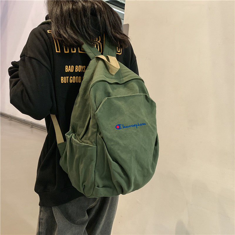 潮牌复古双肩包学生书包帆布