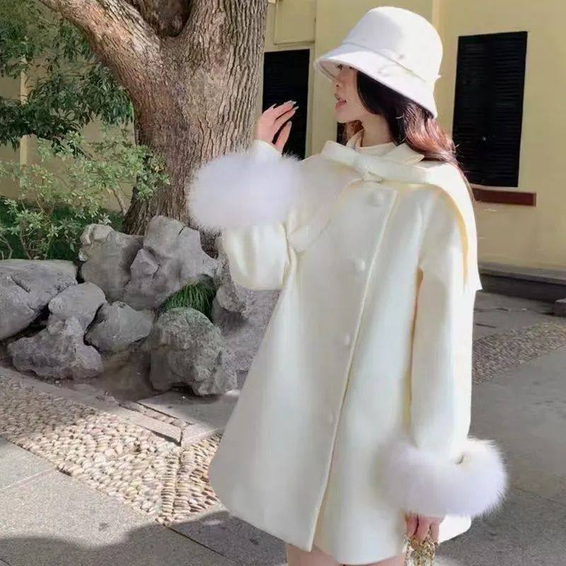 韩系高级感杏色蝴蝶结斗篷大衣女秋冬甜美千金风宽松显瘦毛呢外套