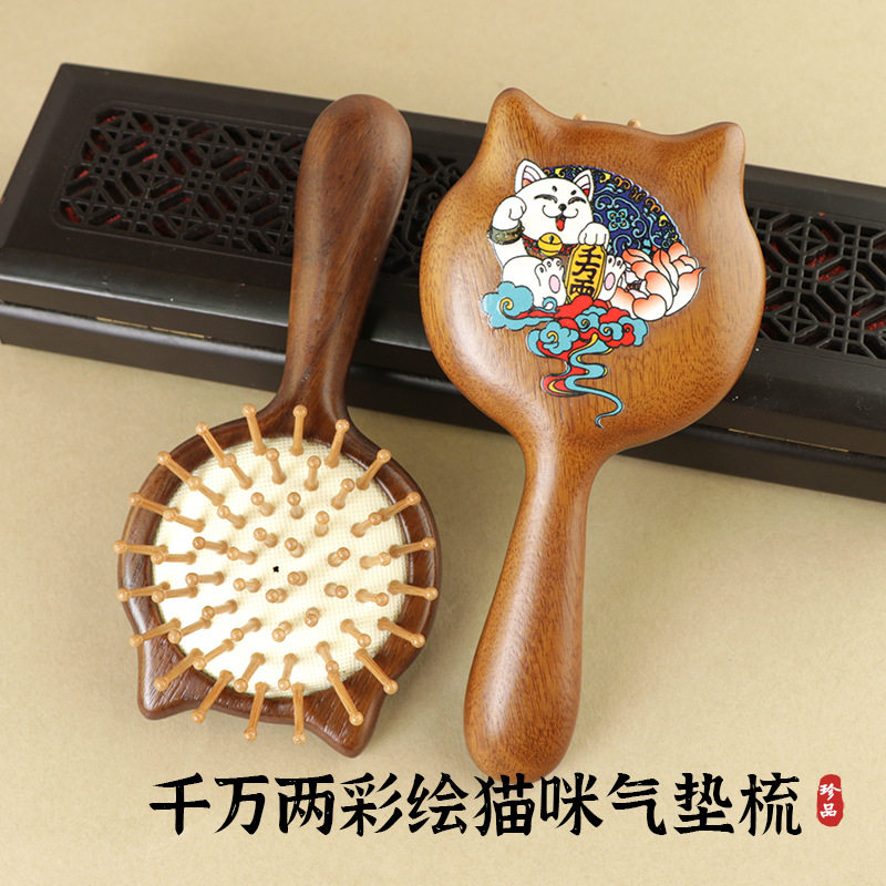 千万两招财猫咪彩绘金丝檀木气垫梳头皮头部按摩气囊梳女蓬松家用