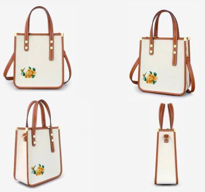 再生棉帆布苗绣定制款皮革通勤小方包