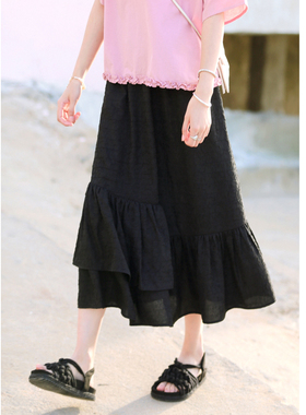 花吉Q534黑色高腰层叠荷叶边宽松学院风半身裙2025新款夏A字半裙