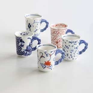 日本进口波佐见烧名窑花朵口暖白釉瓷马克杯咖啡杯日式红茶杯具