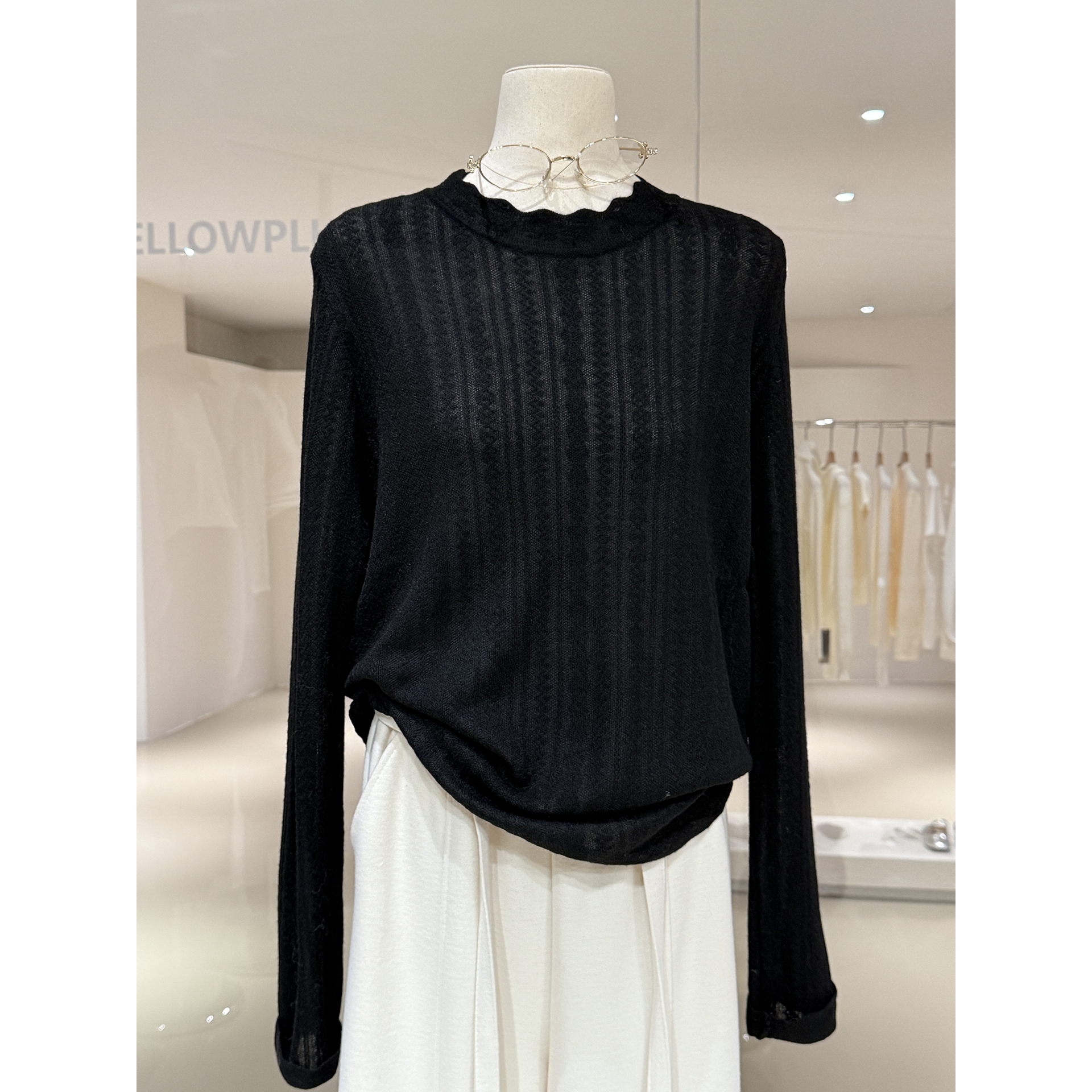 知性优雅波浪形圆领提花针织衫女