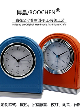 新品包邮橙色皮制夜灯光静音闹铃酒店客房小蓝色时尚简约轻奢闹钟