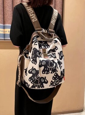 法国MKBM轻奢小吉象旅游双肩包女新款潮时尚旅行休闲户外笑脸背包