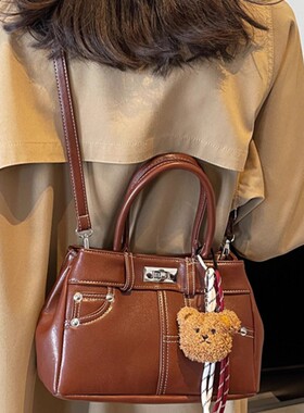 MK DA女包2025秋冬新款复古大容量手提水桶包百搭通勤单肩斜挎包