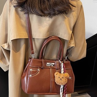 MK DA女包2025秋冬新款复古大容量手提水桶包百搭通勤单肩斜挎包