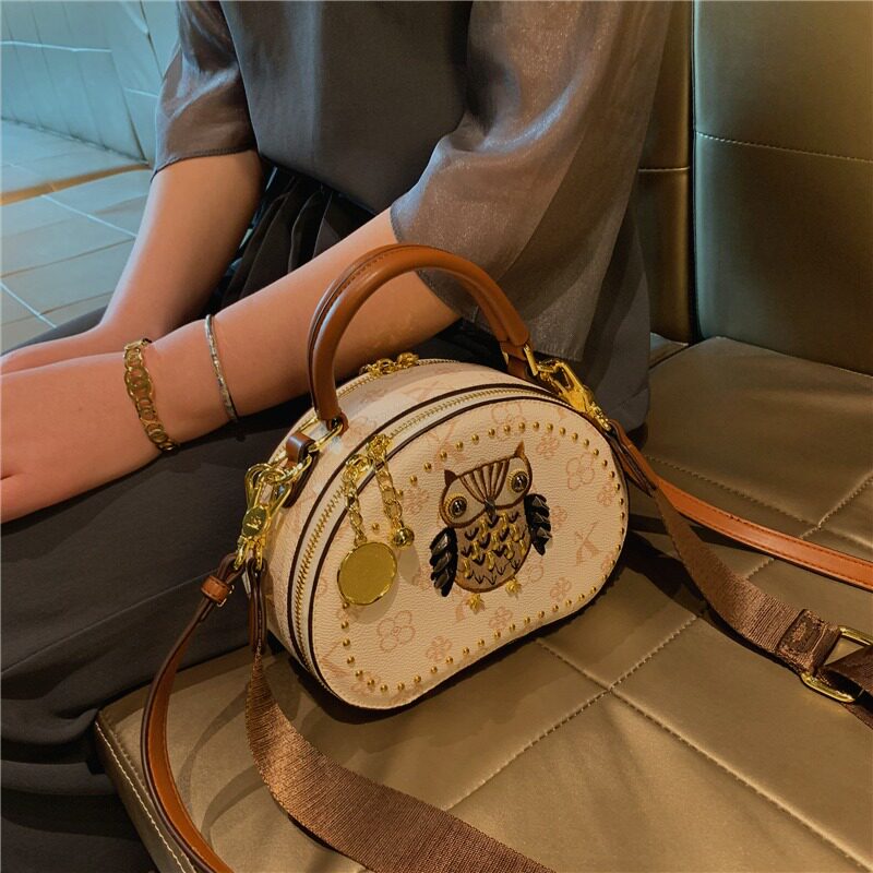 超火小众不撞款包包猫头鹰贝壳包女2026新款巨好看手提单肩斜挎包