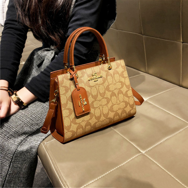 品牌包包女士2026新款高级感时尚真皮手提包单肩斜挎小个子托特包