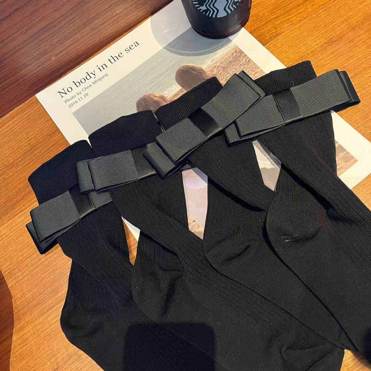 黑色蝴蝶结中筒袜子女秋冬季jk袜学院风韩版高筒袜长袜堆堆袜网红