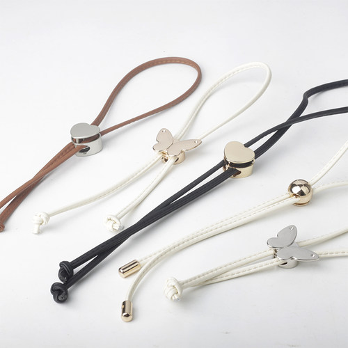 蝴蝶卡扣超纤皮水桶包抽绳带