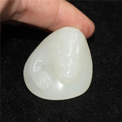 小石头和田玉籽料吊坠