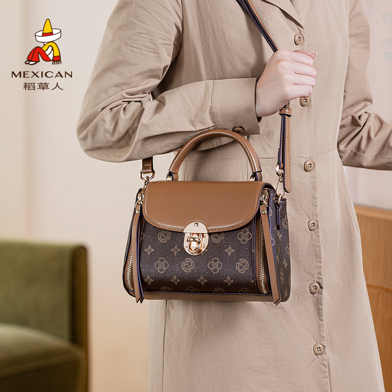 稻草人精致时尚老花手提包斜挎包