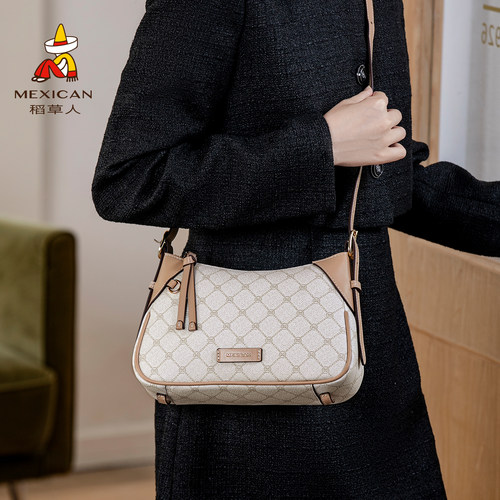 稻草人包包大容量时尚印花斜挎包