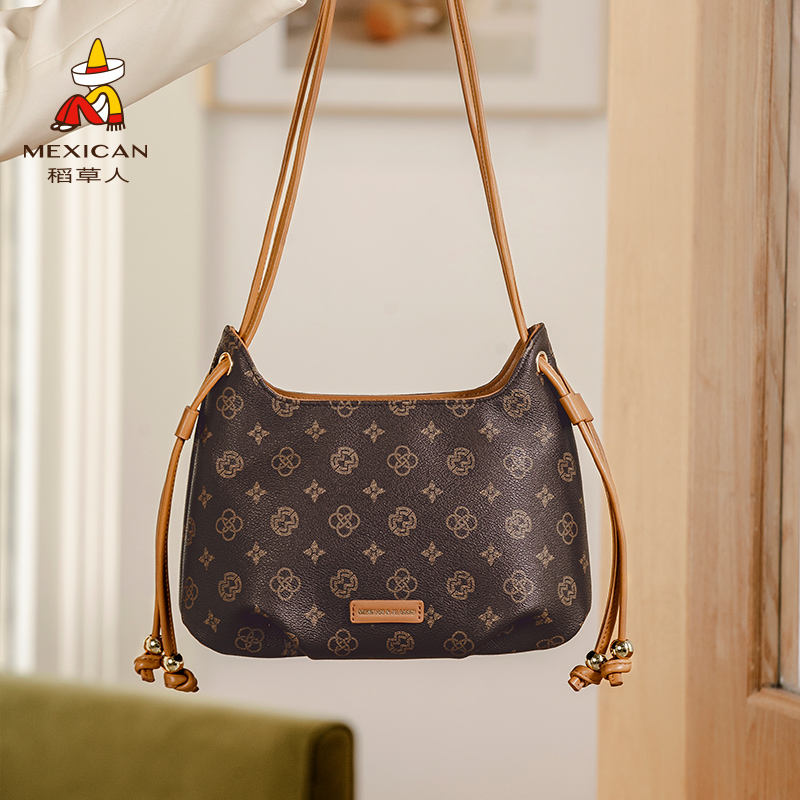 稻草人小众时尚印花水桶包斜挎包