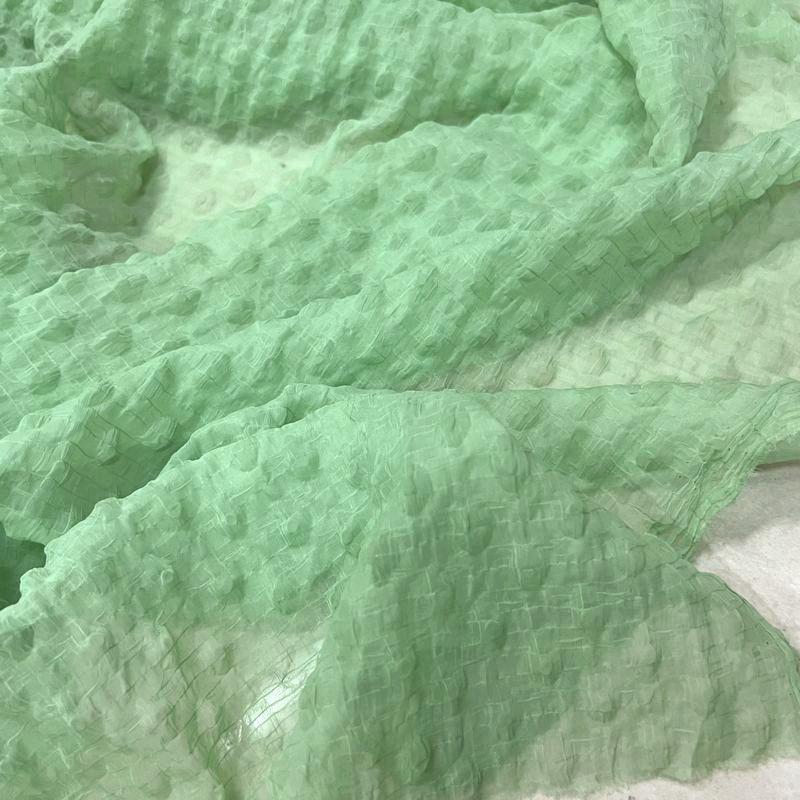 化纤面料 春夏娃娃衫裙子 果绿色肌理色织圆点泡泡皱提花雪纺布料