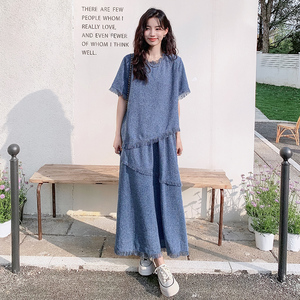 清冷松弛感穿搭套装裙女夏新款小香风不规则流苏上衣半身裙两件套图片