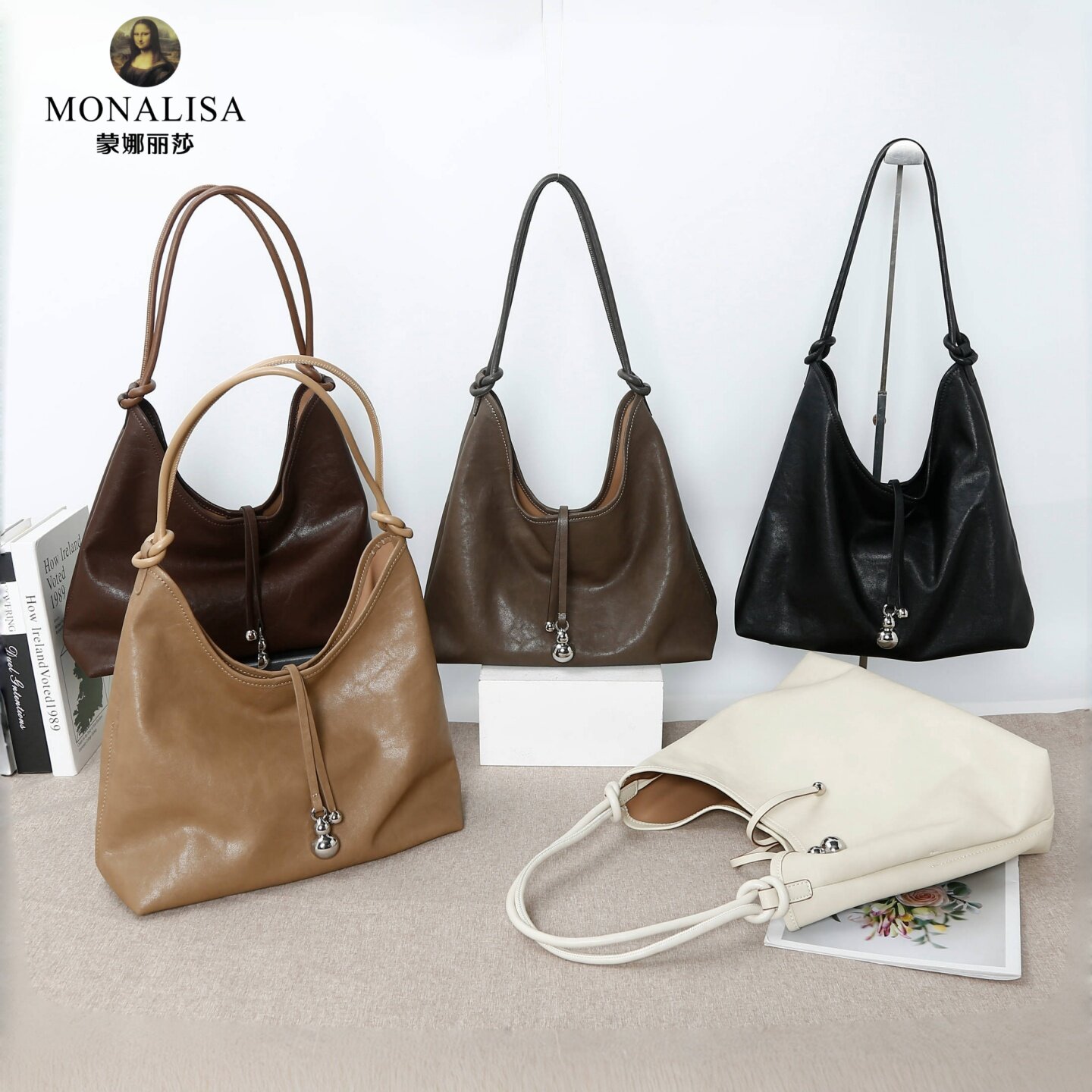 蒙娜丽莎女包2025秋季新款牛皮时尚百搭简约单肩斜挎手提包水桶包