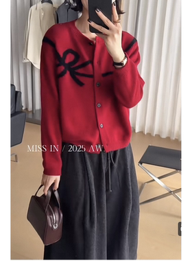 欧洲站2025冬季新款女时尚胸前大蝴蝶结印花圆领羊毛针织开衫毛衣