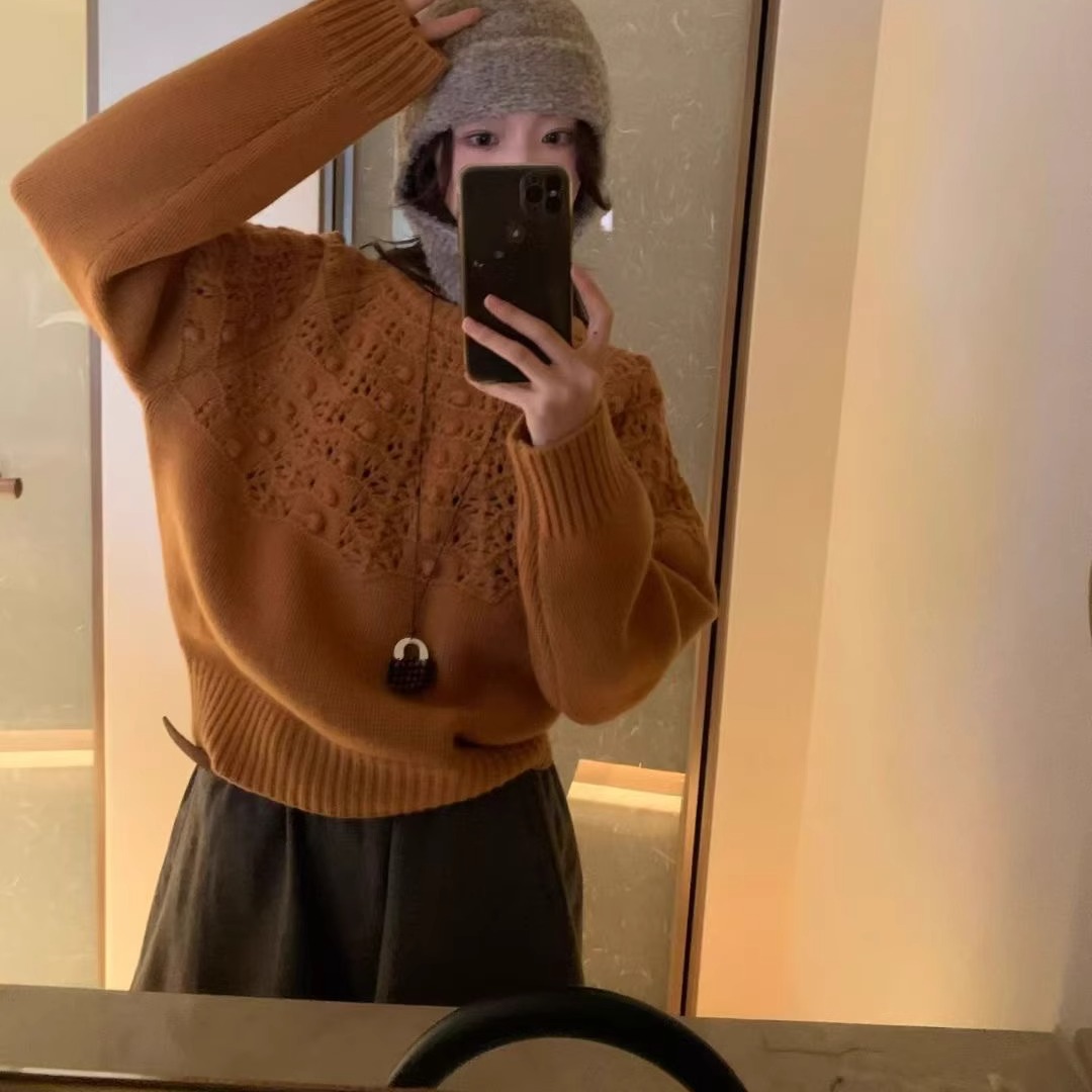 欧洲站2025秋冬新款欧货女潮纯色圆领宽松羊毛镂空球球针织衫上衣