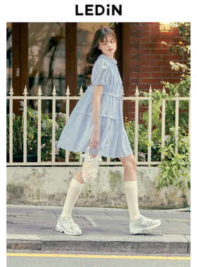 乐町飘逸娃娃裙年夏季新款流苏系带A字裙甜美韩版宽松连衣裙