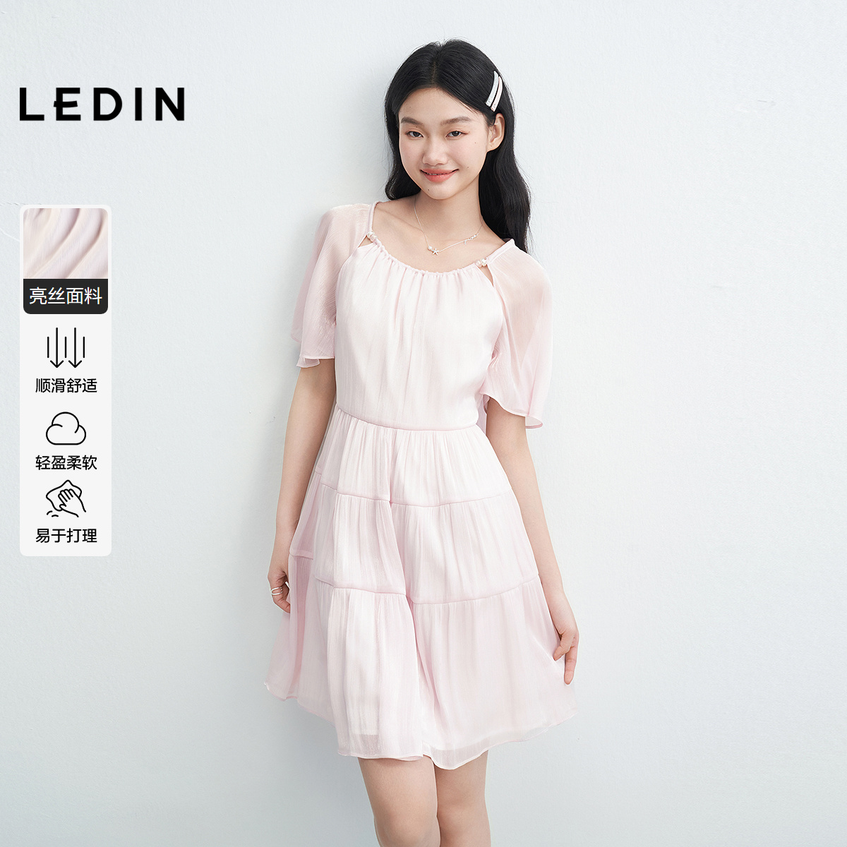 肩部镂空串珠设计  后领绑带蝴蝶结下摆拼接