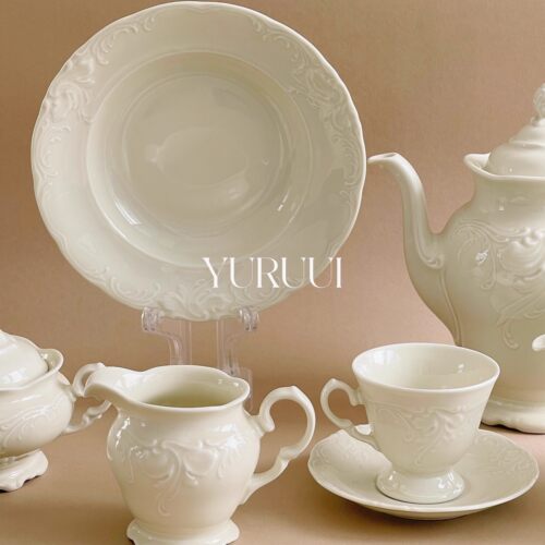 [YURUUI设计师]波兰Kristoff奶黄色复古浮雕设计家用陶瓷杯碟餐盘